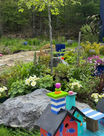 This joyful Westport Island garden brings color and whimsy into the yard. Courtesy of Christine Hopf-Lovette