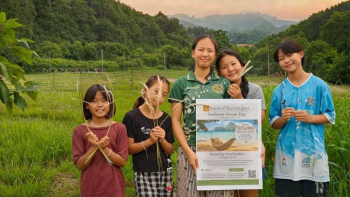 A group of the newest arrivals at the Friends of Thai Daughters residential program in Mae Chan, displaying a poster for FTD’s Sunflower Dream Trip Sweepstakes. Courtesy of Ellen James