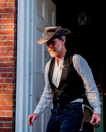 “Sheriff” Hart has been known to make arrests on the spot during Jailhouse Rock. Photo by Bob Bond