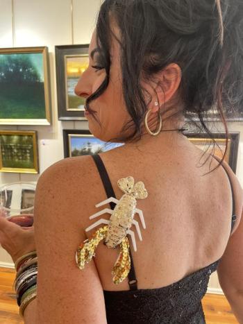 Award-winning plein air artist, Crista Pisano, displays her lobster ware in Sylvan Gallery during the August 2025 Wiscasset Art Walk. Lucia Droby photo