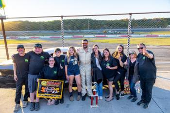 Kevin Sherman is joined by friends and family following his $6,000 Crown Vic win. Jasen Dickey photo
