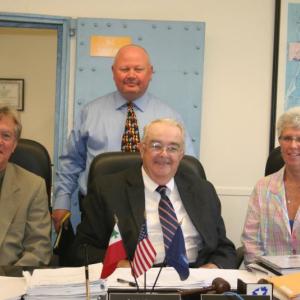 Tim Pellerin gave his resignation to the County Commissioners, from left, Sheridan Bond, William Blodgett and Lynne Orne, at their June 18 meeting.