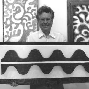 John M.T. Seitzer with “Trophy Wave.” Mixed media on wood.