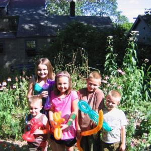 Peter, Jade, Jasmine, Gavin and Emmett show off their fancy balloon creations courtesy of Amazing Lou. Courtesy of Wiscasset Public Library.