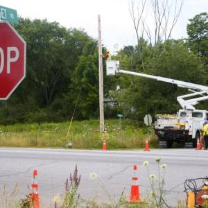 A commercial truck from Bowdoinham tore down power and cable lines in two towns, causing damage to vehicles and a building before being stopped by police on July 25. JOHN MAGUIRE/Wiscasset Newspaper Crews repair damaged lines at the intersection of Route 1 and Nequasset Road. JOHN MAGUIRE/Wiscasset Newspaper
