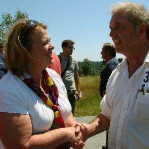 Richard Jordan shakes hands with Wiscasset Town Manager Laurie Smith after Jordan bought the Wiscasset Raceway July 12. SUSAN JOHNS/Wiscasset Newspaper