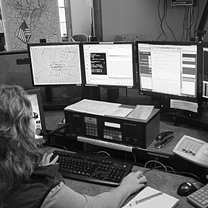 Below, Teresa Grenier demonstrates how the Emergency Medical Dispatch protocol software operates. She said she hopes new protocol software for fire and law-related emergencies will “speak” with the Computer Aided Dispatch software used by Lincoln County Communications that automatically records information that's typed in. JOHN MAGUIRE/Wiscasset Newspaper