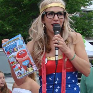 Waffle Girl Anya Arsenault shares information about one of the contest prizes – a slushy maker. LISA KRISTOFF/Boothbay Register