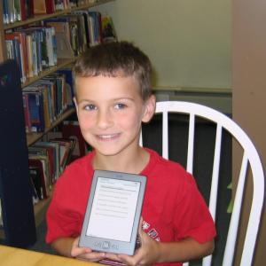 Kindle drawing winners Chance, right, a third grader at the Wiscasset Primary School, and Josh, below, a fifth grader at Wiscasset Middle School. The drawing marked the end of the Dream Big-Read Summer Reading Program at the Wiscasset Public Library.
