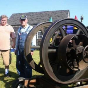Robert Meixell of Westport Island is the owner and chief trustee of his farm “powerplant,” one of several machines he brought to Maine from Pennsylvania. The powerplant was one of a few machines and interesting gadgets at the celebration. JOHN MAGUIRE/Wiscasset Newspaper Robert Meixell of Westport Island is the owner and chief trustee of his farm “powerplant,” one of several machines he brought to Maine from Pennsylvania. The powerplant was one of a few machines and interesting gadgets at the celebration. JOHN MAGUIRE/Wiscasset Newspaper
