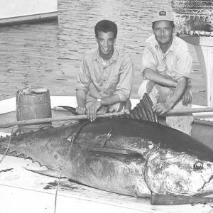 Bob Damrell and Pat Elderkin on a dock in Boothbay Harbor with a tuna they caught in 1963. Courtesy of June Elderkin Bob Damrell and Pat Elderkin on a dock in Boothbay Harbor with a tuna they caught in 1963. Courtesy of June Elderkin