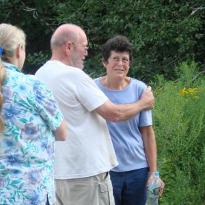 Brigit Britton of Boothbay gets a hug from husband Eric Traphagen after she was rescued from Trout Brook Preserve in Alna. SUSAN JOHNS Wiscasset Newspaper