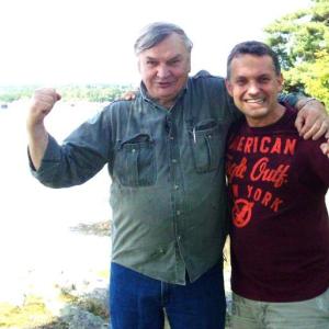 Ray Shadis and videographer Christophe Espenan ham it up; Sheepscot River, Wiscasset Mason Station in the background. Courtesy of Friends of the Coast
