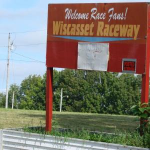 A couple of months ago, an auction announcement stood next to this sign. Now, the grass is freshly cut and the track's new owners are less than two months away from a planned race. SUSAN JOHNS/Wiscasset Newspaper