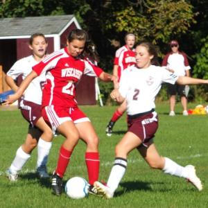 Midfielder Miranda McIntire tries to move the ball against Monmouth defenders on Wednesday. Kathy Onorato/Wiscasset Newspaper
Midfielder Miranda McIntire tries to move the ball against Monmouth defenders on Wednesday. Kathy Onorato/Wiscasset Newspaper