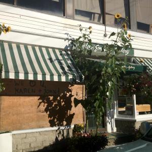 The Gold/Smith Gallery was burglarized shortly before 3 a.m. on Wednesday, Sept.19. The day after the robbery, below, community support was expressed to gallery owners John and Karen Vander on the plywood covering the broken window. LISA KRISTOFF/Boothbay Register
