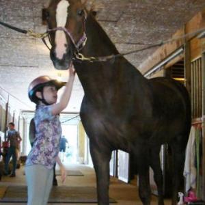 Caroline Cadorette and Ellie, representing Sea-Vu Farm in Boothbay, just pulled off a national division title. They are seen here at the barn in Boothbay August 24. SUSAN JOHNS/Wiscasset Newspaper