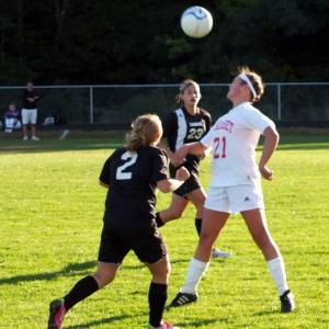 Wiscasset's Miranda McIntire heads the ball down field. KATHY ONORATO/Wiscasset Newspaper 