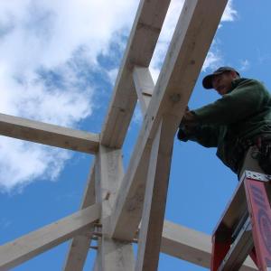 Mark Casad of Warren Wood Wrights works on the barn that will serve as an event venue and a drying house for lavender grown at the farm. SUSAN JOHNS/Wiscasset Newspaper