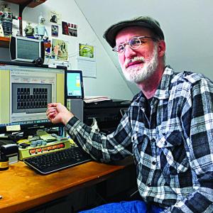 Guy Marsden can monitor how much energy his home uses and how much his family saves by using available sunlight. JOHN MAGUIRE/Wiscasset Newspaper