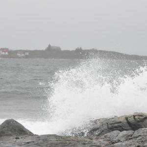 Waves crash against Ocean Point on Monday, Oct. 29, as Hurricane Sandy moves through the Midcoast. High tide and strong wind pushed seas up to nine-foot swells around noon. BEN BULKELEY/Boothbay Register