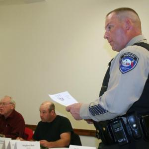Kenneth Mason of the Lincoln County Sheriff’s Department combs over his department’s budget line item by line