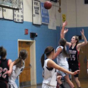 Alecia Faukingham, No. 15, goes after a rebound. KATHY ONORATO/Wiscasset Newspaper