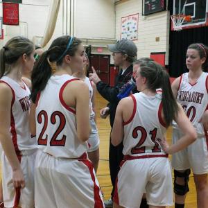 Wiscasset Coach Patrick Quinn discusses team strategy during a timeout during their scrimmage with Morse High School November 28. KATHY ONORATO/Wiscasset Newspaper Wiscasset Coach Patrick Quinn discusses team strategy during a timeout during their scrimmage with Morse High School November 28. KATHY ONORATO/Wiscasset Newspaper