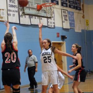 Wiscasset's Brianna Goud, No. 20, gets a shot off over a Telstar defender during Friday’s season opener. Below: Alecia Faukingham, No. 15, goes after a rebound. KATHY ONORATO/Wiscasset Newspaper Wiscasset's Brianna Goud, No. 20, gets a shot off over a Telstar defender during Friday’s season opener. KATHY ONORATO/Wiscasset Newspaper