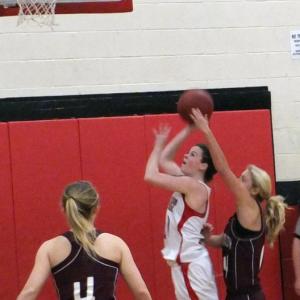 Brianna Goud draws a foul from the Monmouth defender while going to the basket. KATHY ONORATO/Wiscasset Newspaper