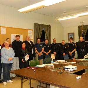 Members of the Wiscasset Fire Department, from left: Selectmen Edward Polewarczyk, Judy Colby, William Curtis, Jefferson Slack, and Pam Dunning, Fire Chief Rob Bickford, Spencer Bailey, Nick Grover, Bob Meisine, Sam Schmal, Steven Smith, and Tim Weatherbee. CHARLOTTE BOYNTON/Wiscasset Newspaper