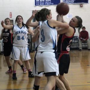 Wiscasset's Heidi Pinkham battles for possession with Dirigo’s Rachel Knight. KATHY ONORATO/Wiscasset Newspaper