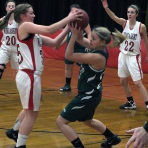 Kasey Cromwell for possession with Winthrop’s Kelsey Stoneton. Below: Miranda McIntire scores for Wiscasset, and Travis Padilla contests a shot during the boys' game. KATHY ONORATO/Wiscasset Newspaper Kasey Cromwell for possession with Winthrop’s Kelsey Stoneton. KATHY ONORATO/Wiscasset Newspaper