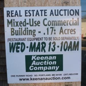 A large sign on the front of 93 Townsend Ave proclaims the date of the auction. KATRINA CLARK/Boothbay Register