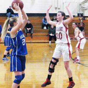 Briana Goud defends a pass. Below: Heidi Pinkham scores on a layup. KATHY ONORATO/Wiscasset Newspaper Briana Goud defends a pass.