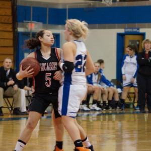Tylan Onorato looks for an opening against Mt. Valley. Below: Alecia Faulkingham stays ahead of two Mt. Valley players. Courtesy of John Anzalone. Tylan Onorato looks for an opening against Mt. Valley.