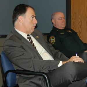 Sagadahoc County Sheriff Joel Merry, left, agreed to draft a letter to the Board of Corrections sharing the authority's concerns as to the need of reducing staff and inmates outside the two counties if the Two Bridges doesn’t receive a quarterly payment from the investment fund.  Sagadahoc Chief Deputy Bret Strout is seated on the right. CHARLOTTE BOYNTON/Wiscasset Newspaper