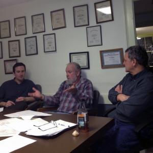 Alna First Selectman David Abbott, center, makes his case to First Selectman Jonathan Villeneuve, left, and Third Selectman David Reingardt, right, that the board should be speaking out against proposed state funding cuts. SUSAN JOHNS/Wiscasset Newspaper