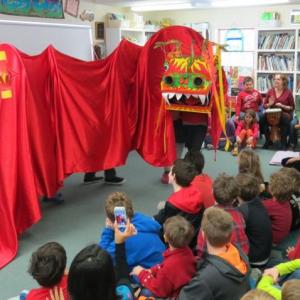 Students enjoy a dragon dance. Below: Fifth Graders Joe Guenther and Nicco Bartone of Bath and sixth grader Ella Dempsey Blair of Phippsburg enjoy Chinese food as part of the school’s Chinese New Year celebration. Courtesy of Center for Teaching and Learning Students enjoy a dragon dance. Below: Fifth Graders Joe Guenther and Nicco Bartone of Bath and sixth grader Ella Dempsey Blair of Phippsburg enjoy Chinese food as part of the school’s Chinese New Year celebration. Courtesy of Center for Teaching and Learning
