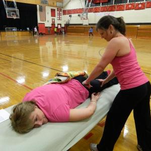 Tracey Verney enjoys a pre-workout massage from trainer Kristina Phillips during Week 2 of Lisa Hall’s Weight Loss Challenge. Below: Patti Jo Averill holds a plank position during a “punishment” workout March 11. KATHY ONORATO/Wiscasset Newspaper Tracey Verney enjoys a pre-workout massage from trainer Kristina Phillips during Week 2 of Lisa Hall’s Weight Loss Challenge. KATHY ONORATO/Wiscasset Newspaper