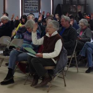 Alna voters make their wishes known during town meeting at the fire station. SUSAN JOHNS/Wiscasset Newspaper