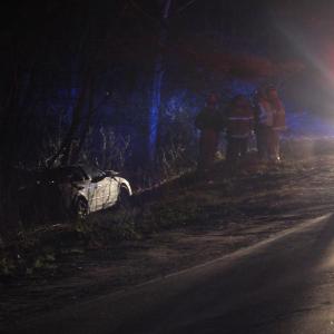 This Nissan Altima crossed Route 218 in Alna then stopped in the woods after its driver apparently missed the Rabbit Path Road stop sign. JOHN MAGUIRE/Wiscasset Newspaper