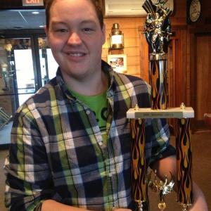 Boothbay native Christopher Holmes with the trophy he won as Mr. Maine March 24. Courtesy Miss Maine Scholarship Program Boothbay native Christopher Holmes with the trophy he won as Mr. Maine March 24. Courtesy Miss Maine Scholarship Program