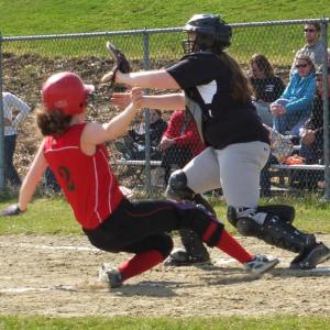 Briana Goud slides safely into home in Wiscasset’s season opener in Lisbon on April 19. KATHY ONORATO/Wiscasset Newspaper