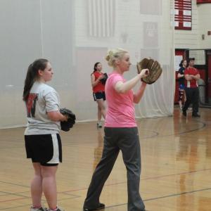 Coach Claire Daniels, right, gives some throwing tips to Charlene Reed at a recent practice at Wiscasset High School. KATHY ONORATO/Wiscasset Newspaper