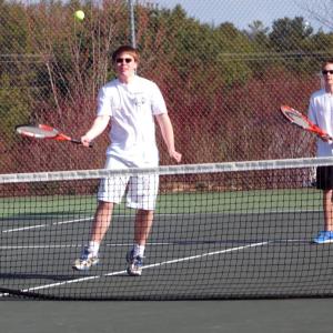 Ridge Barnes and Andrew Walton play a close doubles match in tennis action with Boothbay. KATHY ONORATO/Wiscasset newspaper