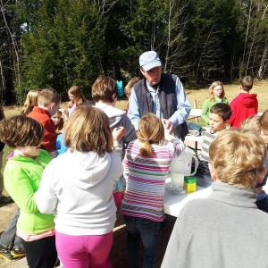 Jeff Averill of Ames Supply teaches children at the Wiscasset Community Center about spring planting. Courtesy of Wiscasset Community Center