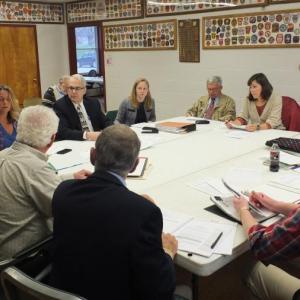 Members of the Wiscasset and RSU 12 withdrawal committees meet April 18 to discuss a draft agreement. JOHN MAGUIRE/Wiscasset Newspaper