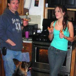 Bailey and his daughter Allison enjoy some pizza together in the kitchen of their Jefferson home. Courtesy of Mike Bailey