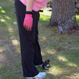 Marie Cooper makes friends with the squirrel. SUZI THAYER/Boothbay Register